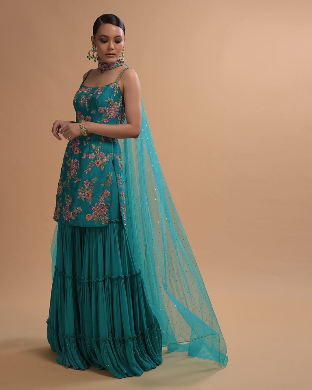 KALKI Fashion - #kalkixkesa🧚🏻
#TealWatersSeries
The teal design reflects flamboyance, which is enhanced further by the scintillating accents of the iconic embroidery. The flowy sharara is teamed with...