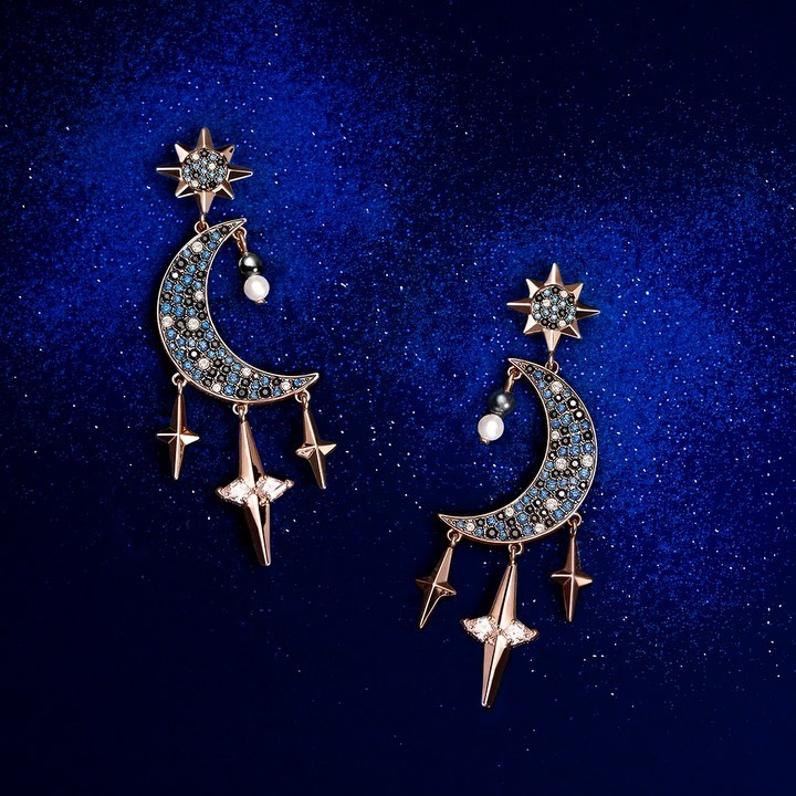 SWAROVSKI - Inspired by the beauty of the night sky, Swarovski Symbolic Collection earrings feature mesmerising moon and star motifs #Swarovski125years