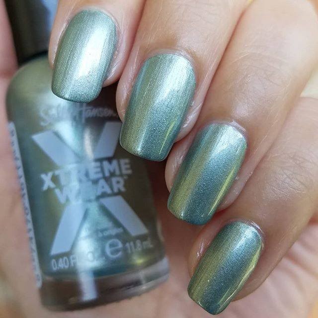 Sally Hansen - Pine Shine perfection ✨. This pearlescent pale green is THE shade of the season, drop a 🧡 if you agree! (💅: @unapologeticallylaura89)