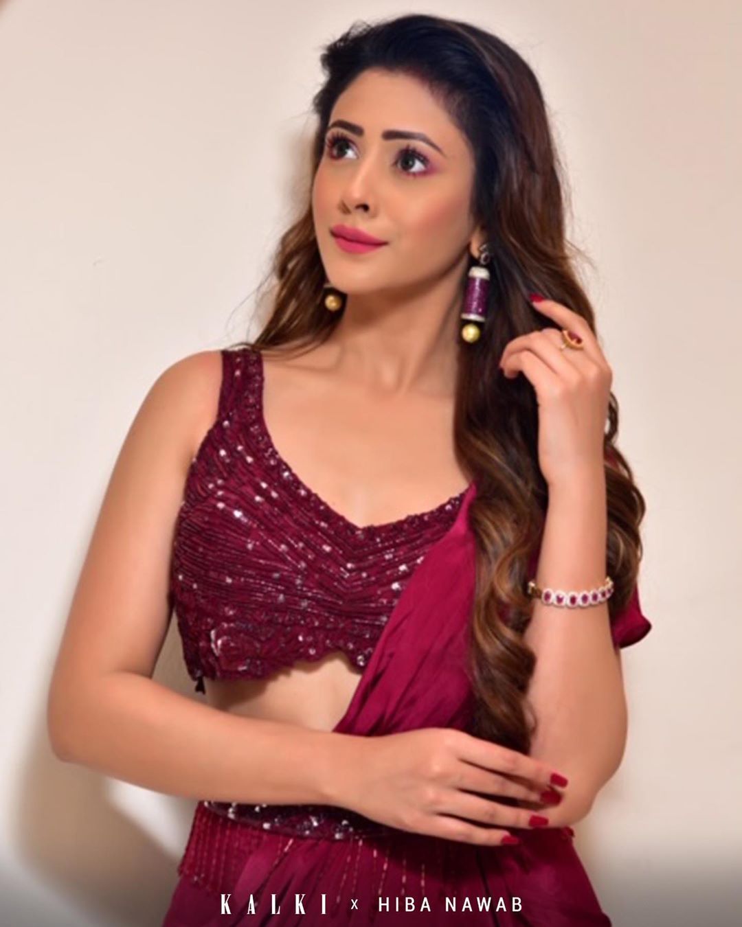 KALKI Fashion - Spotted @hibanawab ! Looking sizzling hot in this super chic and stylish ready pleated ruffled saree with a gorgeous embellished blouse. Tying the entire look together is the modern ta...