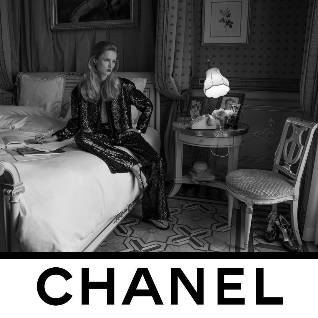 CHANEL - INTERIOR: BEDROOM.
The allure of an all-sequinned CHANEL suit — Rianne Van Rompaey wearing the CHANEL Spring-Summer 2021 Ready-to-Wear collection. Part of a series of 12 scenes photographed b...