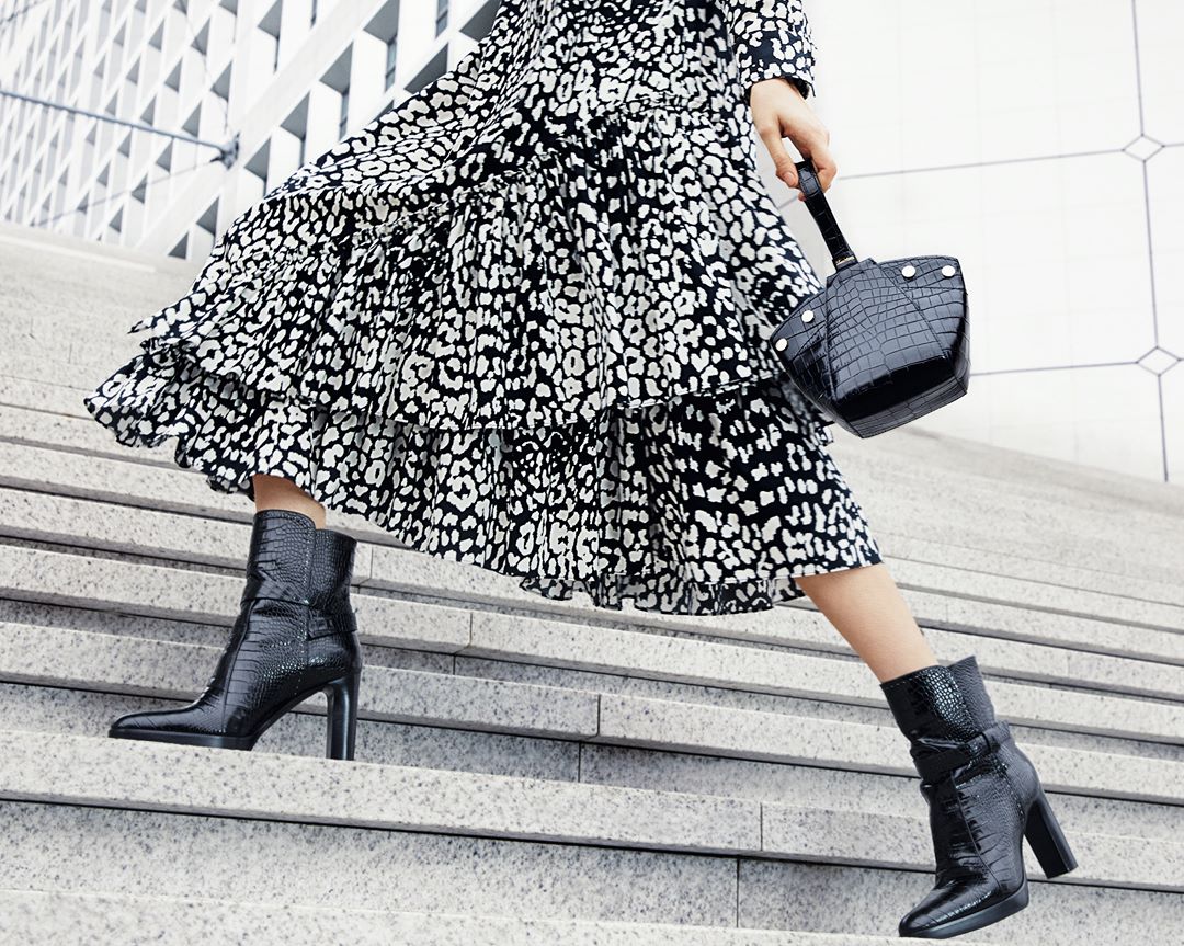 Max Mara - Made for walking. Explore the #MaxMaraFW20 timeless ankle boots and flouncy floral dress, complete with the #MaxMara #FW20 mini shopper bag in croc-embossed leather now in-store and at maxm...