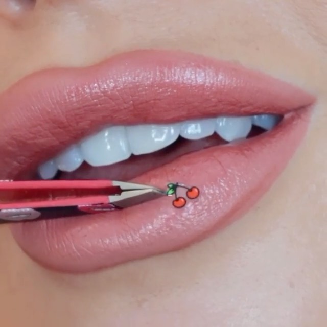 Ciaté London - Cherry lips 💋🍒 how cute is this look?! @ccclarke elevates her nude lip with #TheCheatSheets Vol.2 easy to use nail stickers 😍 #regram #ciate