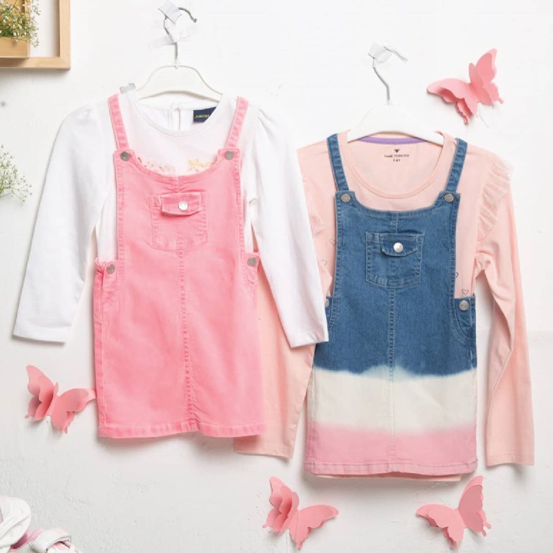 Lifestyle Stores - Say hello to #FashionThatProtects with Virobar antiviral apparel for kids. Pick these colorful denim dresses with adorable splashes of pink! Shop more in kidswear from the Virobar C...
