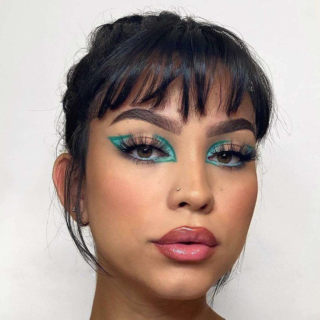 NYX Professional Makeup - This graphic eye is everything 🙌💎 @gemsrodri wears our Butter Gloss in 'Tiramisu' + EPIC WEAR LINER STICKS in 'Intense Teal' & 'Blue Trio' to get the look 🔹✨ • #nyxcosmetics...