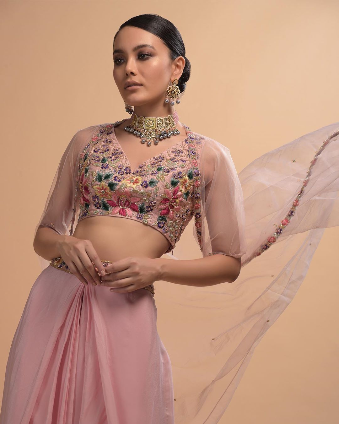 KALKI Fashion - #kalkixkesa🧚🏻
#TaleoftheIcyPinks
This ensemble is a heady mix of contemporary silhouettes ranging from center-pleated straight skirt to carved into a floral embroidered V neck bustier,...