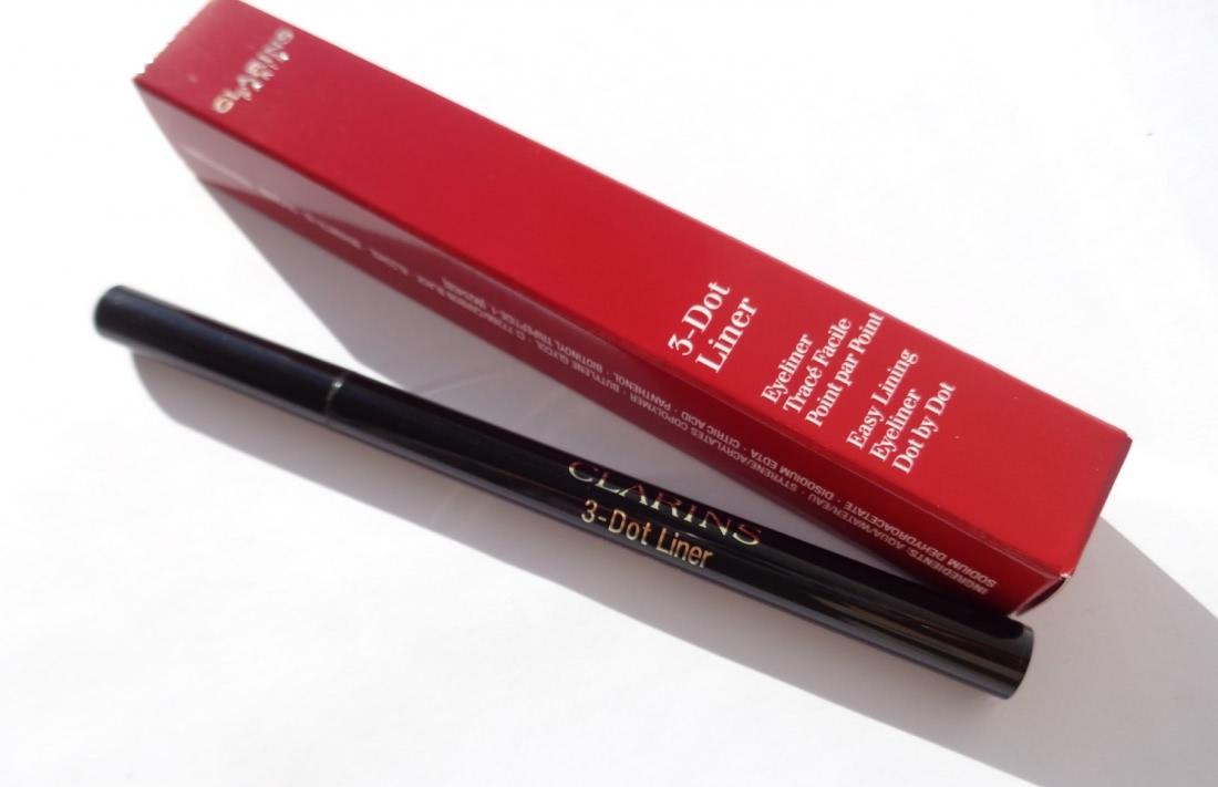 Clarins 3 dot liner. Clarins подводка для глаз 3-Dot Liner. Подводка жидкая кларанс. Подводка кларанс трезубец. Кларанс подводка для глаз трезубец.