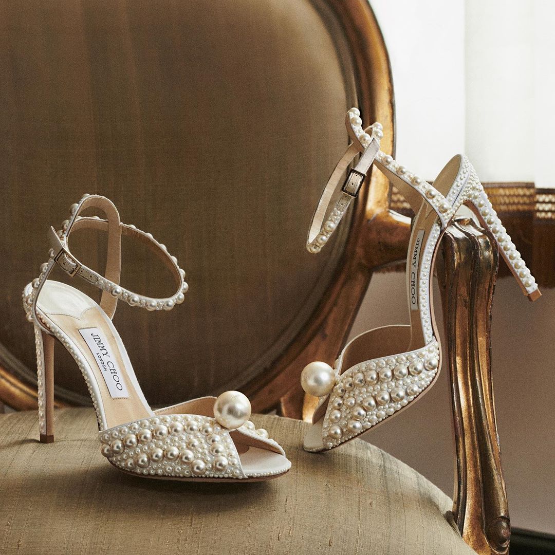 Jimmy Choo - Symbolic of wisdom and serenity, pearls are a key detail for the new season, as seen on the timelessly chic SACORA sandals #JimmyChoo