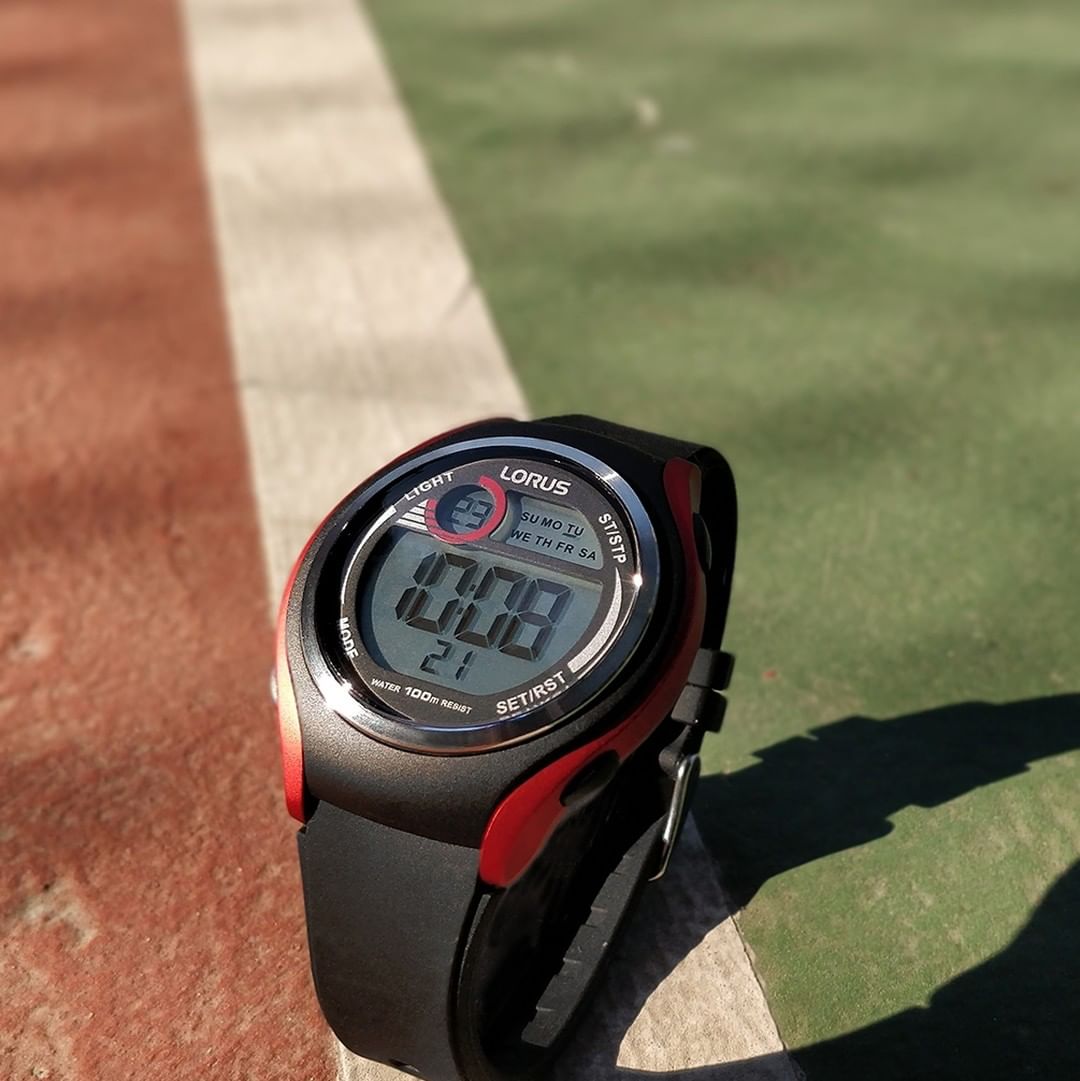 Watches2U - ⁠Make tracks with this sporty companion. ⁠
⁠
Black and red silicone, with a dual time and date/day LCD display, plus illumination, stopwatch and alarm. Water resistant to 100M.⁠
⁠
⌚Lorus M...