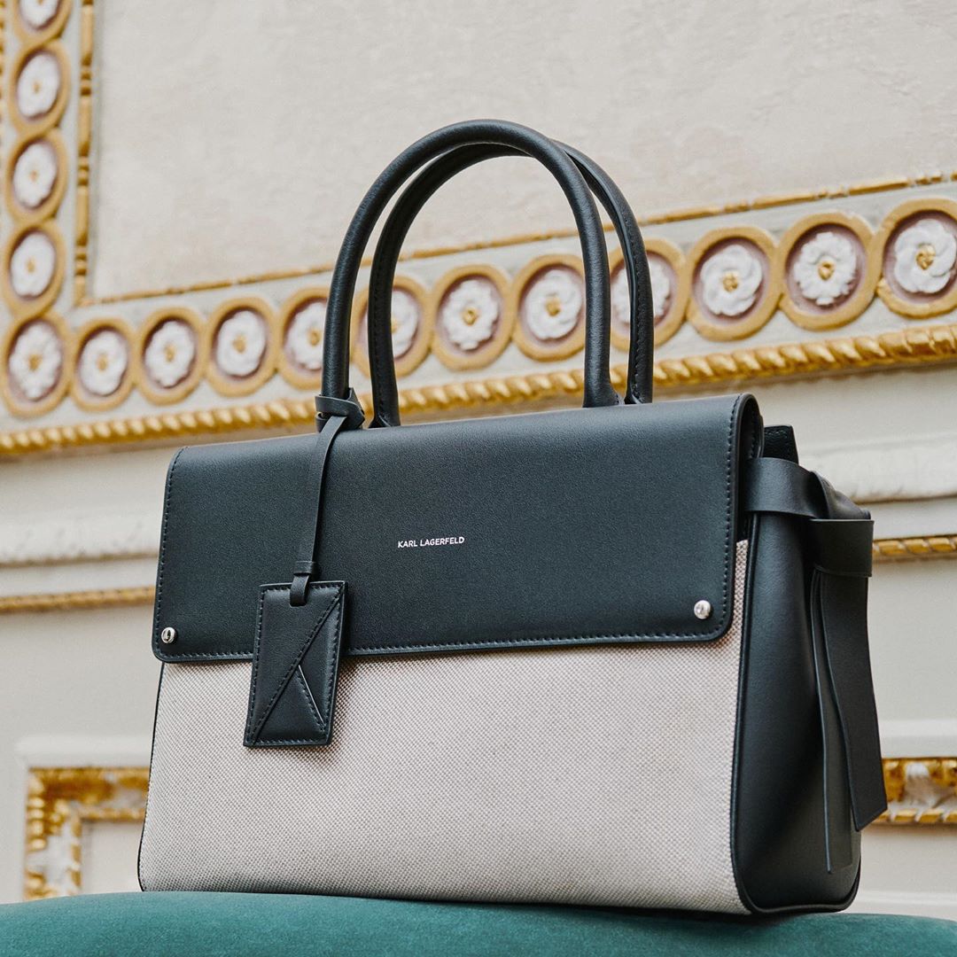 KARL LAGERFELD - A canvas exterior gives the K/Ikon a summery twist. Tap to shop! #KARLLAGERFELD #BAGLOVER