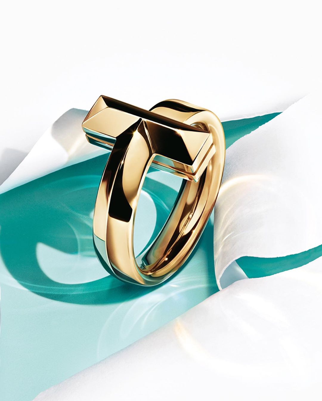 Tiffany & Co. - Go for the gold. The Tiffany T1 collection—now in 18k yellow gold—takes unbreakable to a whole new level. Tap to set the standard and discover more via the link in bio. #TiffanyT1 #Tif...