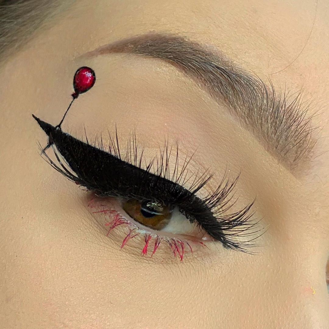 NYX Professional Makeup - We all float down here 🎈 @julibake creates this sharp winged liner using our Epic Ink Liner + Vivid Brights Liner in 'Vivid Fire' 🖤 • #nyxcosmetics #nyxprofessionalmakeup #cr...