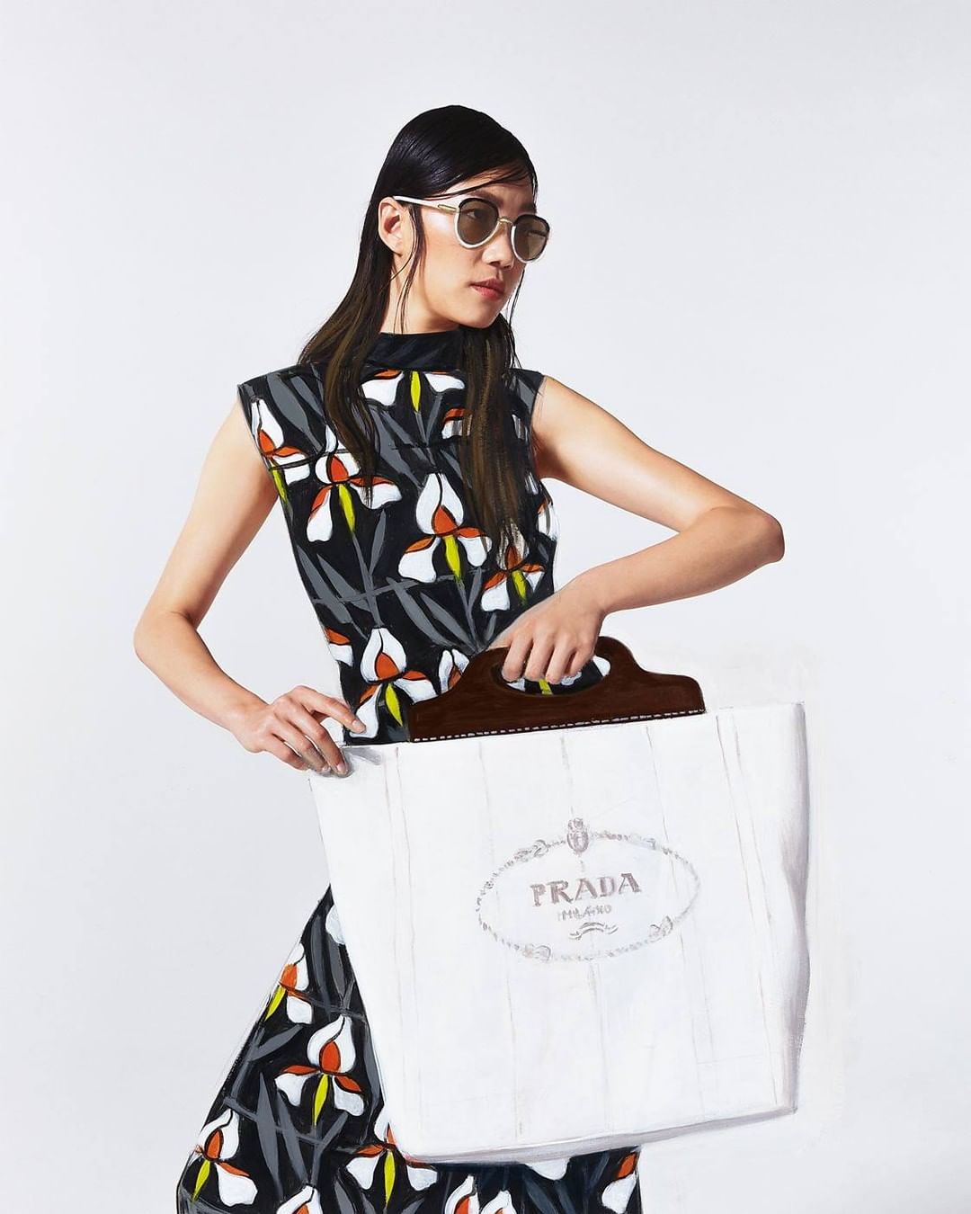 Prada - An artist at work: printed poplin, linen blend, and leather, in an original painting by @falkgernegross. 
Discover more via link in bio. 
#PradaSummerStories 
#PradaSS20 
#Prada