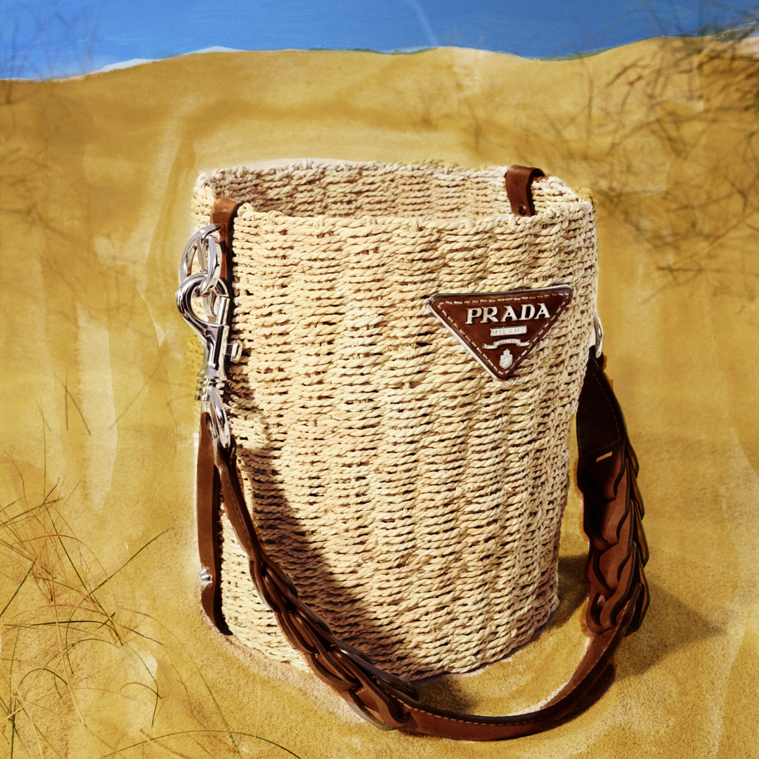 Prada - A beachy bag for all occasions. Discover the handwoven maize husk basket with braided calf leather strap and more via link in bio.⠀
#PradaPreFall20⠀
#PaintedinPrada⠀
#Prada