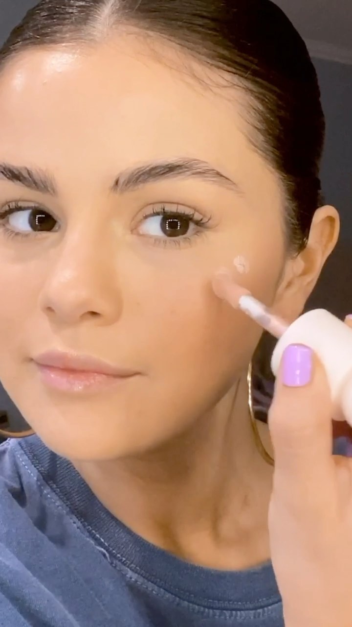 Rare Beauty by Selena Gomez - How to make @selenagomez’s glow your own 👀With your fave shade of Positive Light Liquid Luminizer: 

✨Apply 2-3 dots on the tops of your cheeks
✨Dot on the tip of your no...
