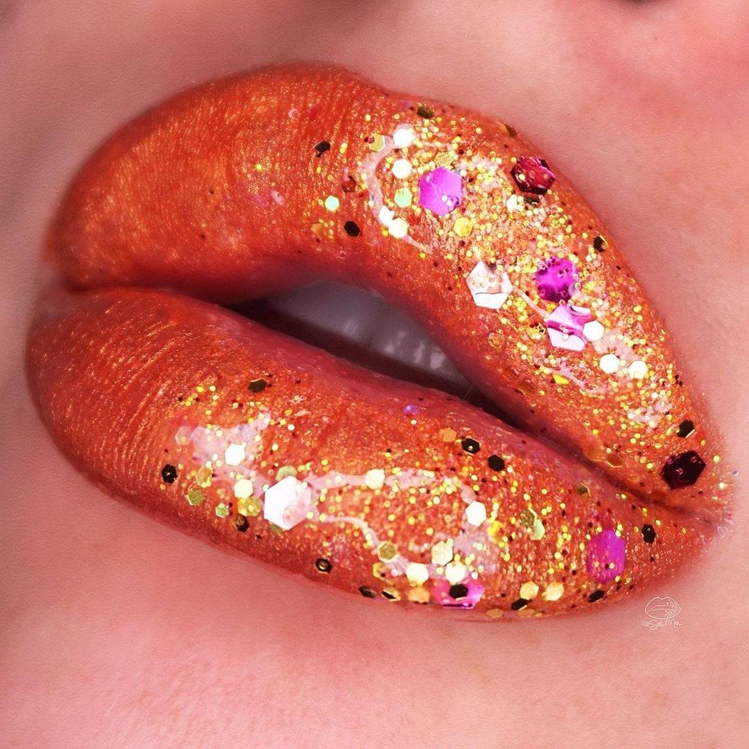 NYX Professional Makeup - Blessing your feed with a lil Halloween lippie 🎃 @sara_mua_ serves up major Fall vibes with this glitter ombre lip 🖤 She uses our Epic Wear Liner Sticks in 'Gold Plated' + 'O...
