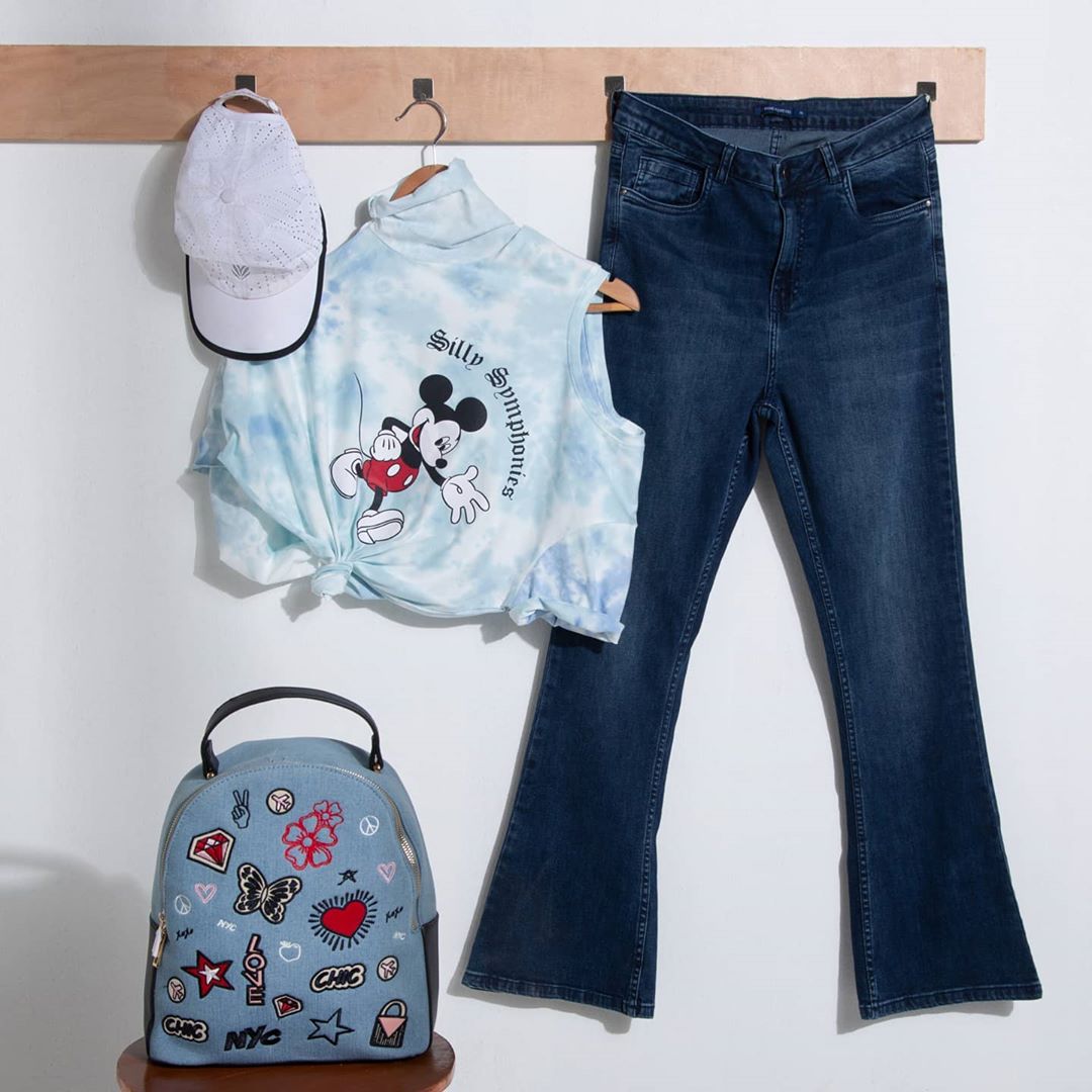 Lifestyle Stores - Let your love for denims show with this stonewashed flared pair from Fame Forever, by Lifestyle... wear with this Mickey-print T-shirt from Ginger and your look's are on point! Stoc...