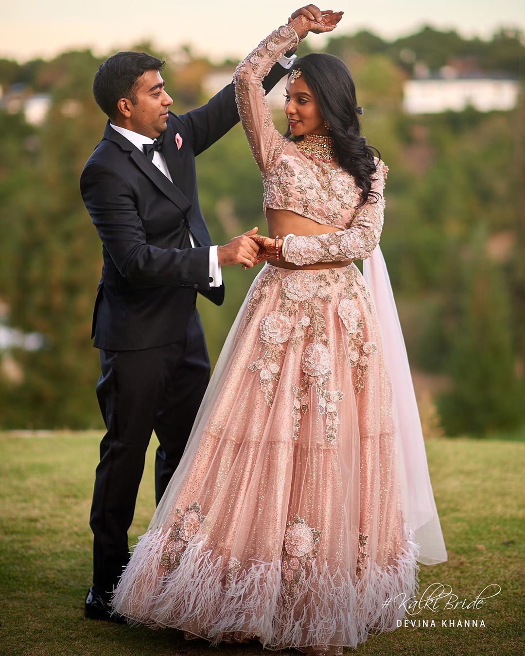 KALKI Fashion - #BridesOfKALKI
Kalki Bride Devina, defied all beauty norms when she swayed into her reception wearing this very chic and classy feathered pastel lehenga and left all the onlookers brea...