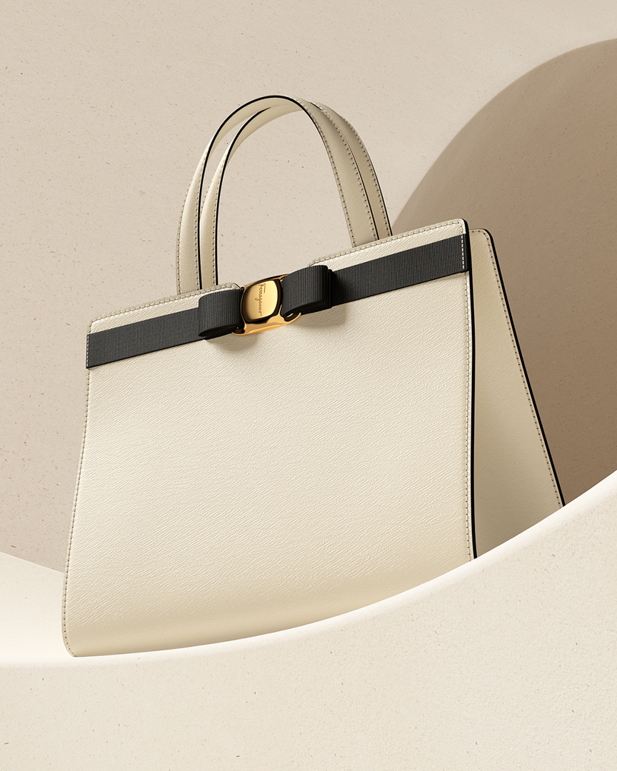 Salvatore Ferragamo - Geometric Perfection: the flawlessly structured Vara Bow Bag, adorned with the iconic grosgrain bow and plaque, delights in its sophisticated simplicity. #VaraBowBag