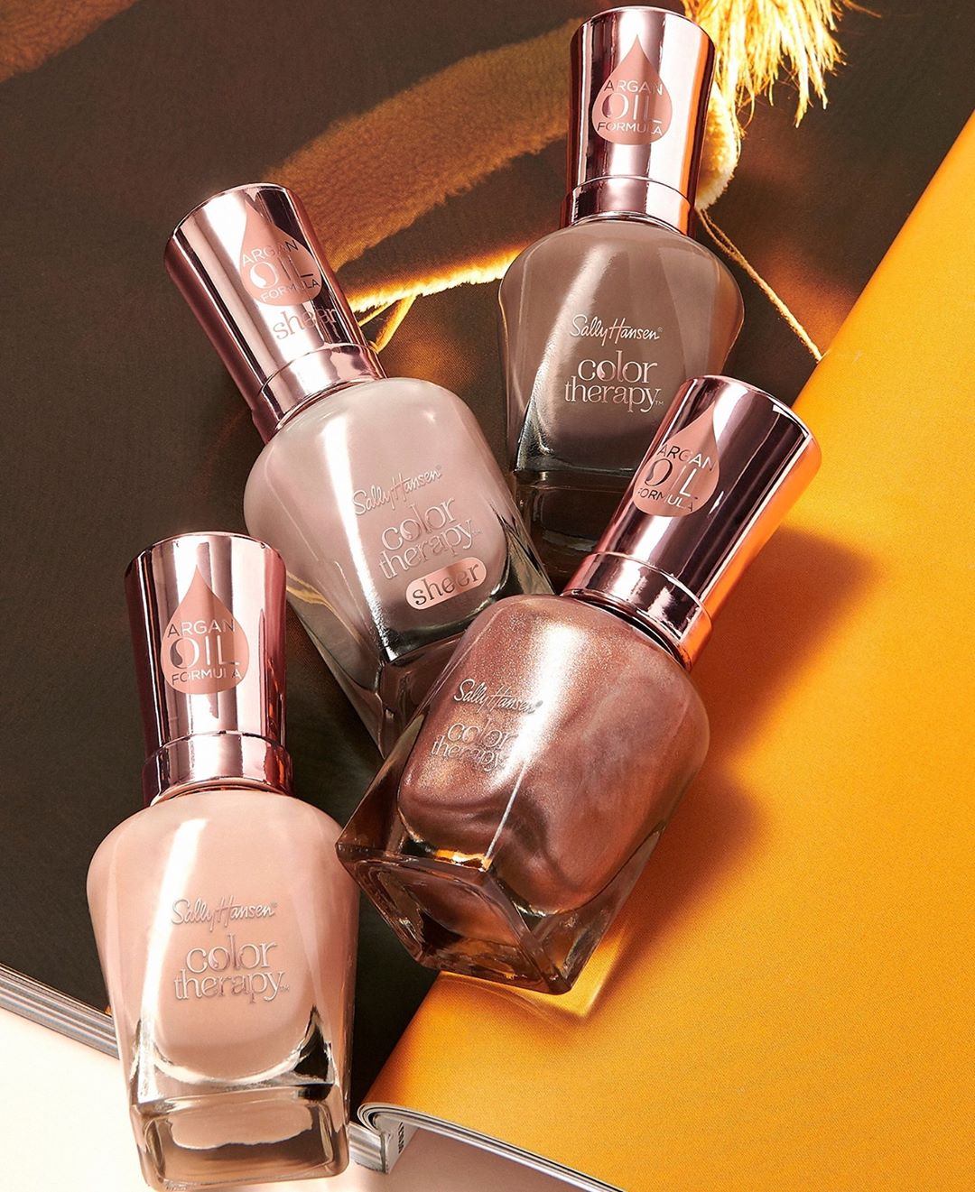 Sally Hansen - Cozy colors for fall 🥰😍. Treat your nails to intense moisture with our Color Therapy nail color in Burnished Bronze, Chai Hopes, Bare Kiss and Blushed Petal 🧡. Check out @target for the...