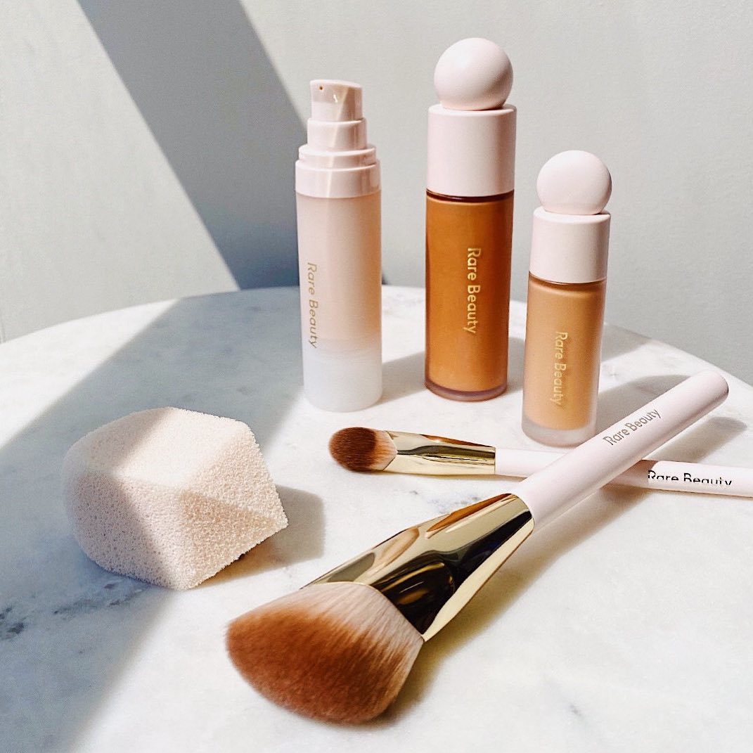 Rare Beauty by Selena Gomez - There are no rules on how to apply your Rare Beauty products. You can freestyle and mix both Always An Optimist Primer with Liquid Touch Weightless Foundation for extra h...