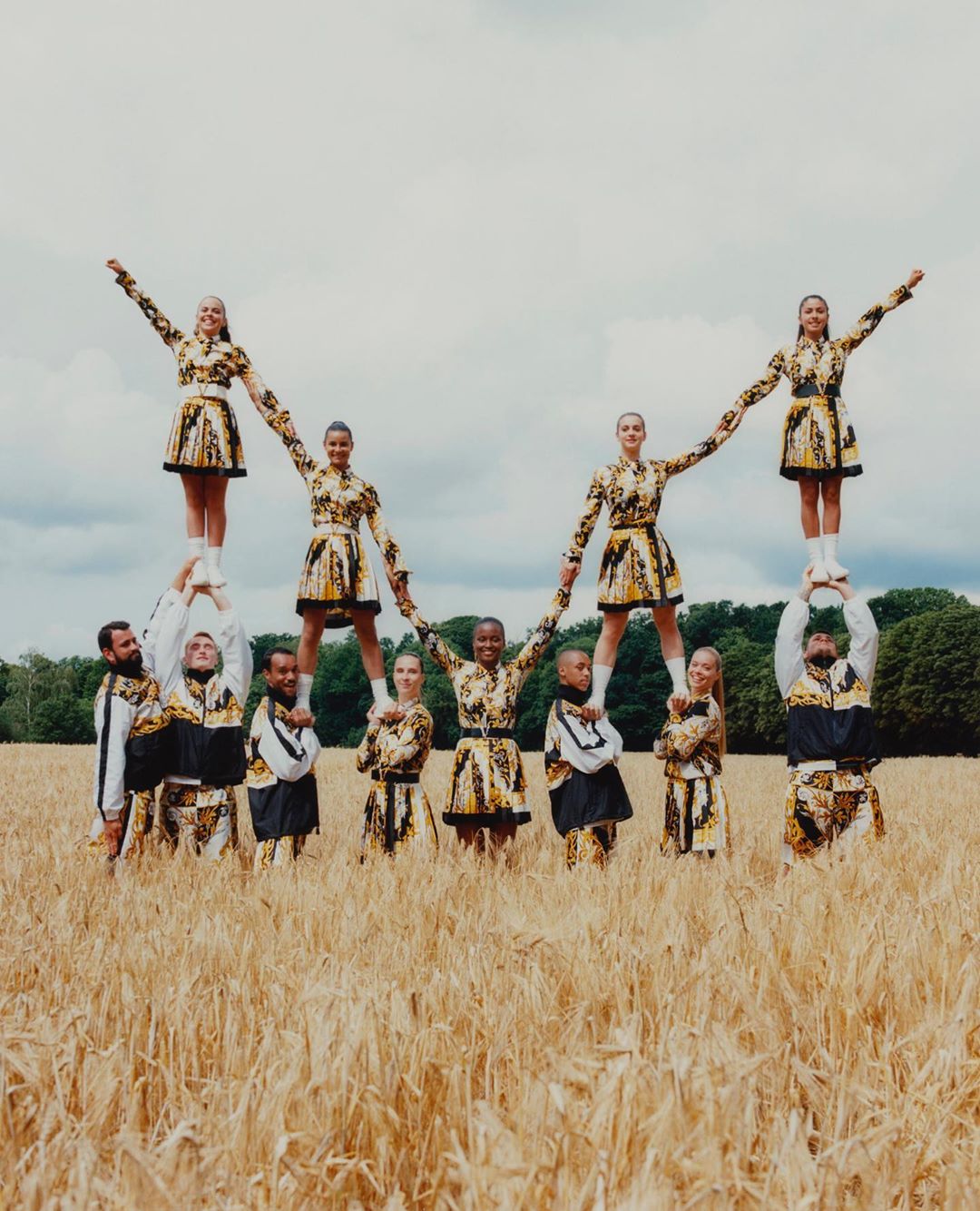 Versace - V impressive - taking inspiration from our Barocco V motif that adorns the #VersaceVirtus handbag line, the @paris.cheer squad create V-shaped pyramids as part of the #VeryVersace series. Th...