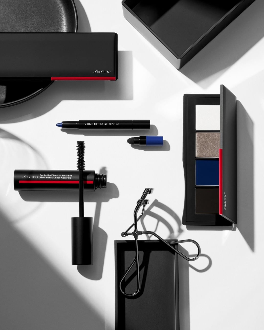 SHISEIDO - The eyes have it. Dress up lids and lashes when the lights go down using our iconic Eyelash Curler, Essentialist Eye Palette in Kaigan Street Waters, Kajal InkArtist in Gunjo Blue, and Cont...