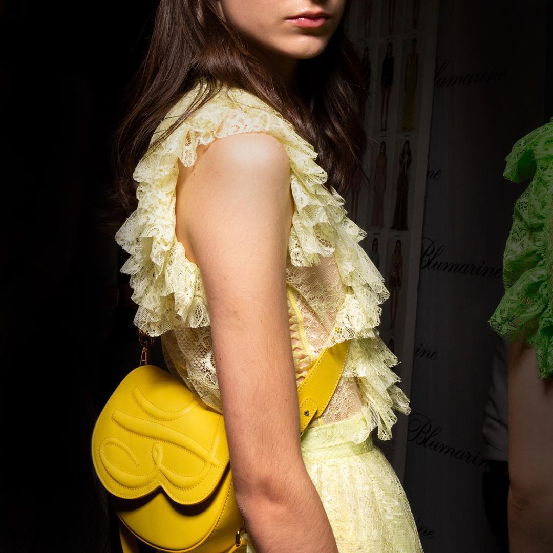 Blumarine - The ultimate must-have accessory for the upcoming summer: the refined #Blumarine bag with embossed logo is finally available also in its yellow version.
#BlumarineSS20 #SS20