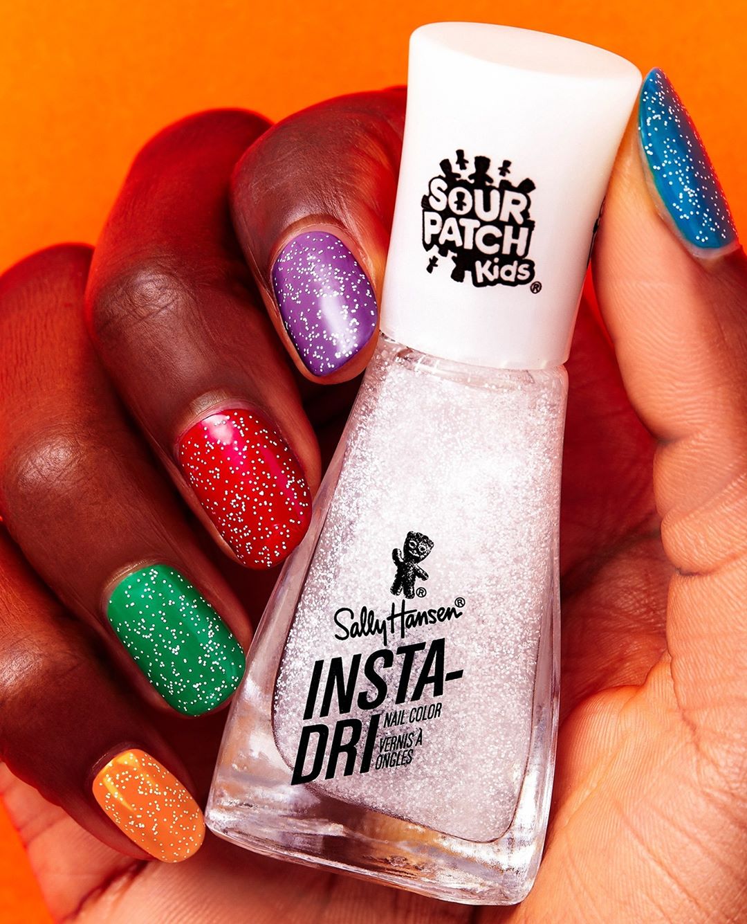 Sally Hansen - Please, sugarcoat it 😋. Layer First Sour then Sweet over your favorite spooky 60-second shade for a candy coating that looks (almost) good enough to eat. #SHxSPK
