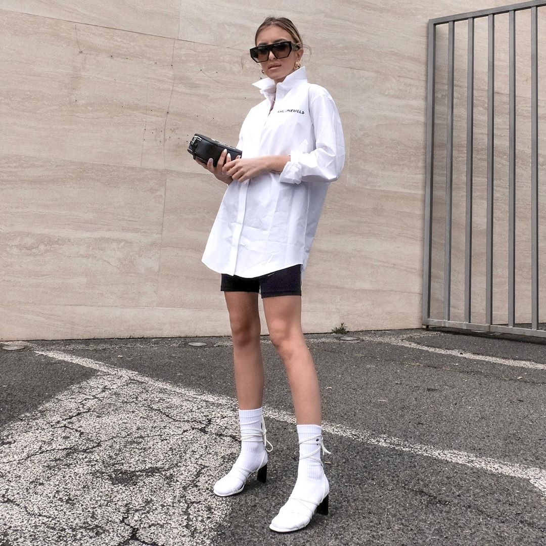 KARL LAGERFELD - All about attitude. 🕶 Living for this look from @elenellis in the graffiti poplin shirt Rue St-Guillaume bag. #KARLLAGERFELD