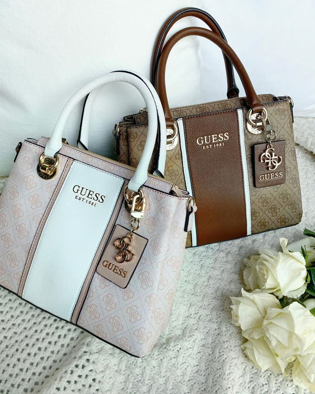 GUESS - pink or tan? 👜 tap to shop this fan favorite logo bag #GUESSHandbags