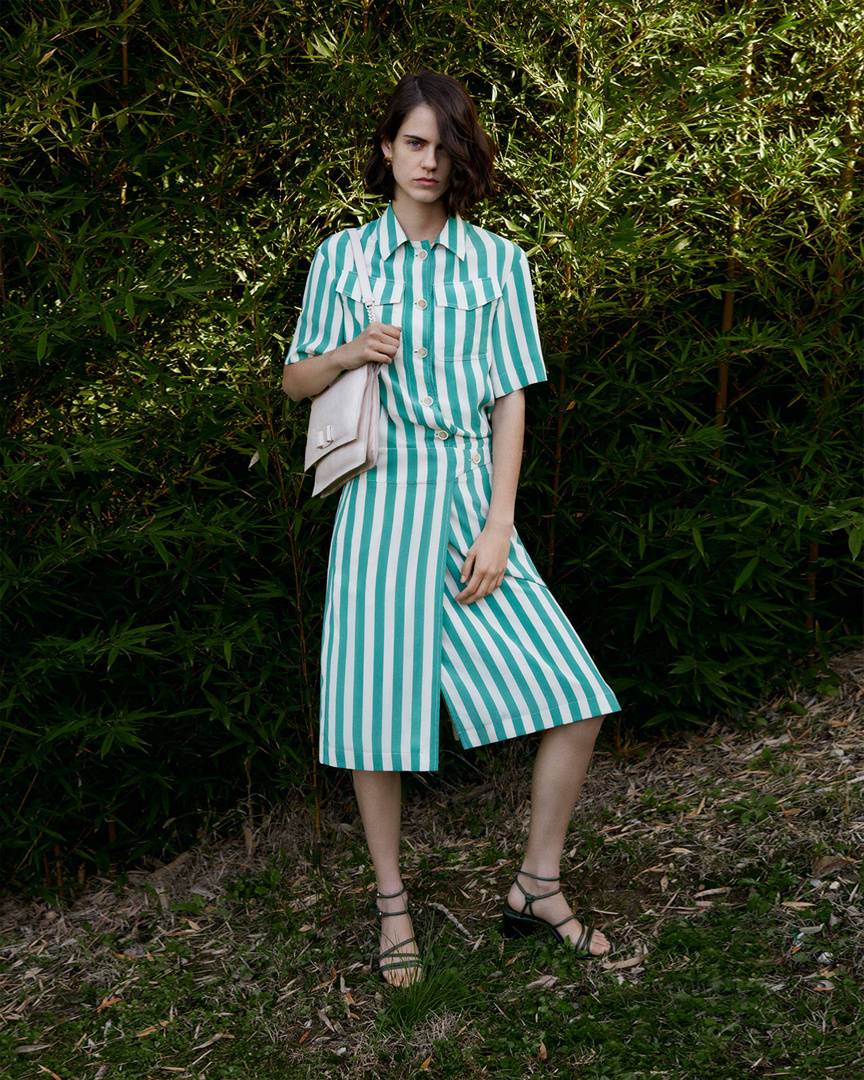 Salvatore Ferragamo - Embrace the summer of casual chic dressing with a sea green and parchment striped silk shirtdress and the versatile #VivaBowBag #FerragamoPF20