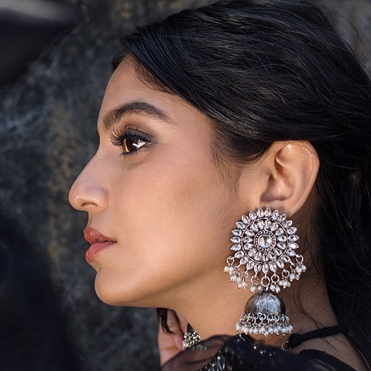 Lifestyle Store - This pair of jhumkas from Fida, makes a bold statement and looks beautiful with a kurta. When wearing a piece like this, keep your neck bare and draw attention to your face. Availabl...