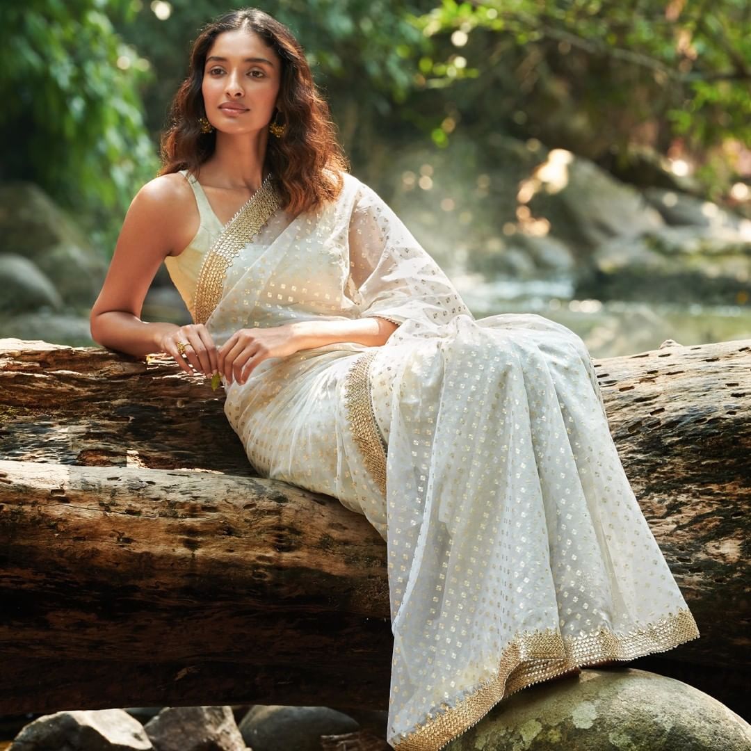 Soch - Embossed with foil print and gota patti , this gorgeous saree is perfect to wrap yourself in for a brunch with family at home.

#sochstories #newarrivals 
#Fashion #EthnicFashion #EthnicWear