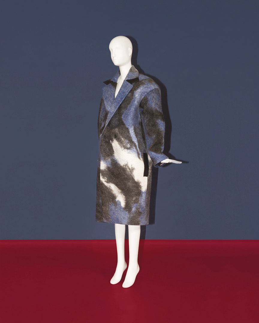 Salvatore Ferragamo - The Sustainable Thinking showcase displays Wyhoys by Lilla Pápai, a striking coat made from merino wool constructed with traditional felting processes, using fabrics dyed in the...