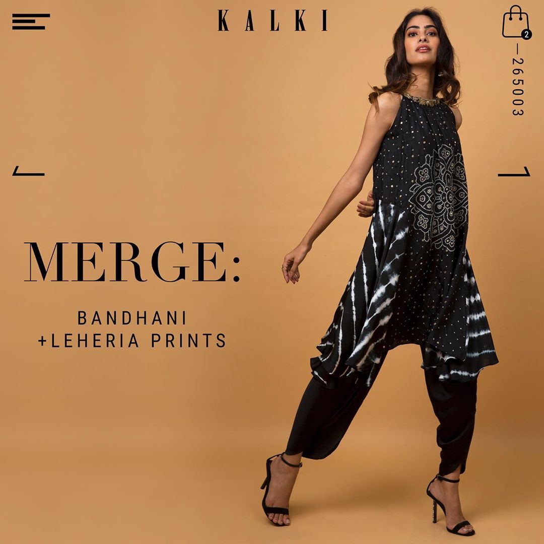 KALKI Fashion - Fusion at its best. The culmination of the traditional giants like bandhani and leheria prints results in a uber stylish dhoti set like this one. Style it with some oxidized jewelry to...