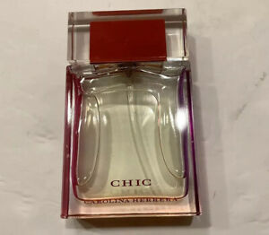  2.7 унций (примерно 76.54 г.) - CHIC Parfum от CAROLINA HERRERA сделано в Испании ни разу не использовался